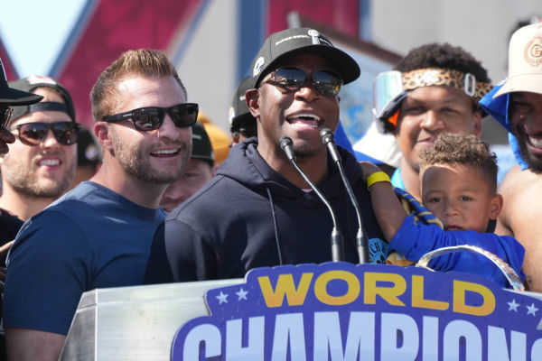Feb 16, 2022; Los Angeles, CA, USA; Los Angeles Rams coach Sean McVay (left) and defensive coordinator Raheem Morris react during Super Bowl LVI championship rally at the Los Angeles Memorial Coliseum.